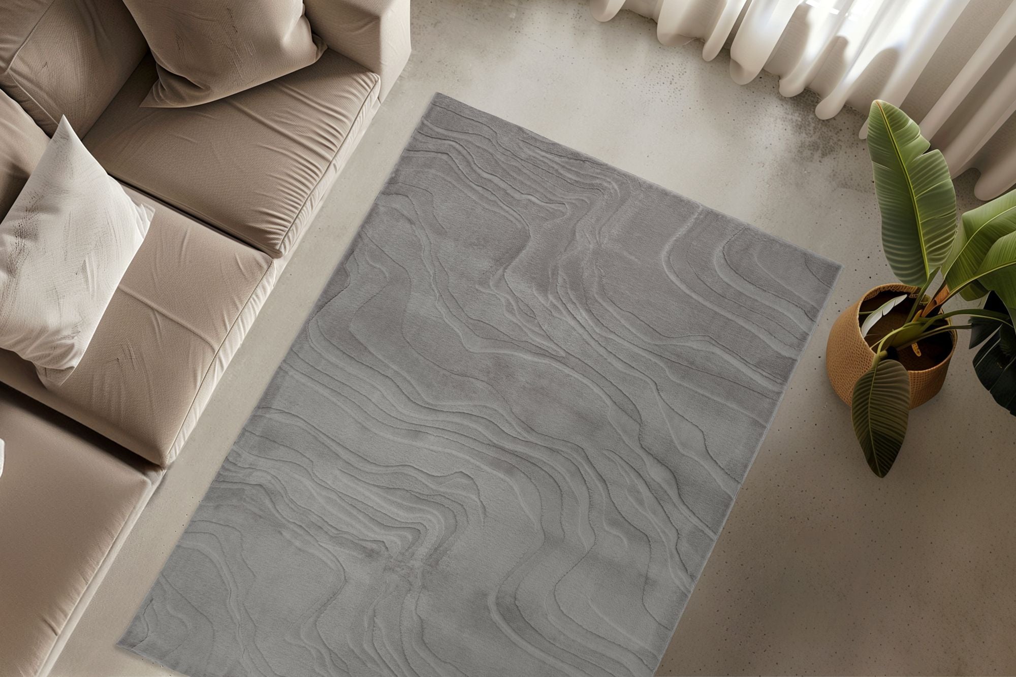 Neuer Teppich Cosmic 525 aus Polyester in grau mit 3D Wellen Schnitt.
